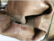 Новые кожаные сапоги 