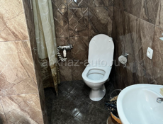 Продается дом в центре города с участком