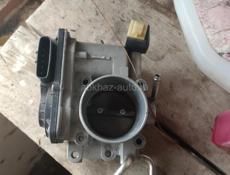 дроссельная заслонка