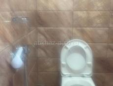 Комнату с кухней.