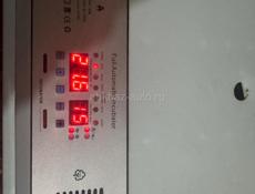 Продаю инкубатор на 64 яйца 