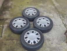 Колёса Хонда фит, родные(штамповки с колпаками с резиной) 