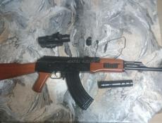 Автомат Ак-47 орбизган