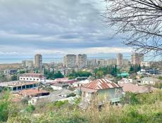 Участок с видом на город