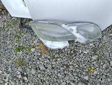 Стекло правая фары 