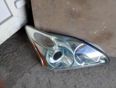 Стекло фара правая 