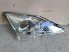 Стекло правая фары 