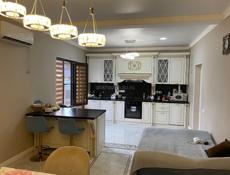 У Моря на Маяке на против свадебного зала Дельмар , 