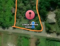 Земельный участок с ветхим строением 