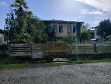 Продается дом в городе Очамчира  12 соток земли 500 метров от моря