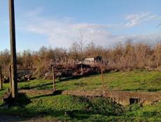 Гулрыпшски р-ион, Агудзера,срочно продается земельный участок 15сотых,или возможно обмен на машину , стоимость 700т.тел 9259345