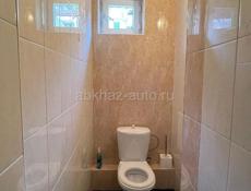 Продам две квартиры участком в центре Гагры