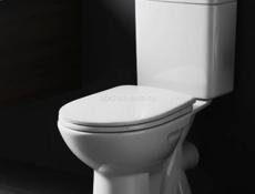 Новые в упаковке унитазы 