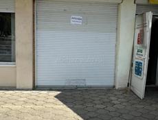 Напротив континента ,рядом с аптекой