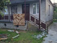 Бельэтажный жилой дом с жилой летней кухней в Сухуме, на уч.6 соток, 800 м от Черного моря, на Маяке, Абхазия