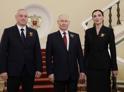 Президент Абхазии Бадра Гунба с супругой Ирмой Хашиг принял участие в военном параде в Москве